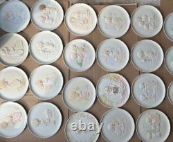 16 Precious Moments Vintage medallion Set