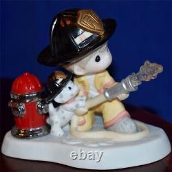 2011 Precious Moments COURAGE UNDER FIRE 11201 Firefighter with Hose RARE