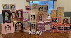 33 piece lot precious moments figurines in boxes see below for full list