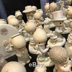 55 precious moments figurines including god loveth a cheerful giver