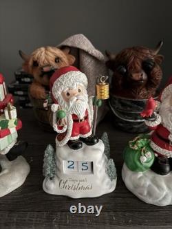 5- Precious Moments Santa's