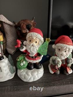 5- Precious Moments Santa's