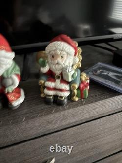 5- Precious Moments Santa's