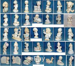 Assorted lot of 25 Precious Moments, NA withbox