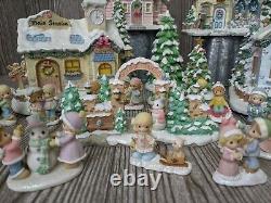 Christmas Village Precious Moments houses and figurines lot