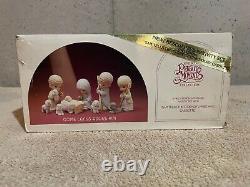 Enesco Precious Moments 9 piece Nativity Set #104000 and Wooden Stable