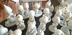 Large Lot of 100 PRECIOUS MOMENTS Figurines One Signed Sam Butcher