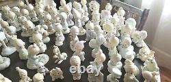 Large Lot of 100 PRECIOUS MOMENTS Figurines One Signed Sam Butcher