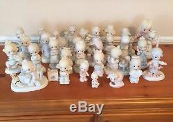 Large Lot of 29 Precious Moments Porcelain 1980's Figurines