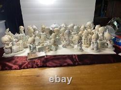 Large Vintage Precious Moments figurines 34 Piece lot. 80s + 90s No Boxes