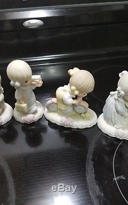Lot 11 Precious Moments Growing In Grace Figurines It's a girl, 1 thru 10