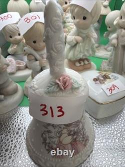 Lot 12 of precious moments figurines