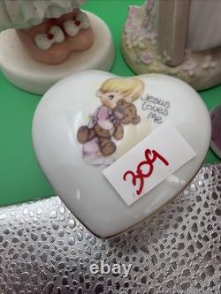 Lot 12 of precious moments figurines
