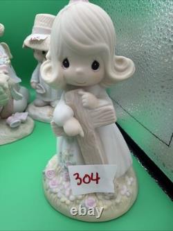 Lot 12 of precious moments figurines