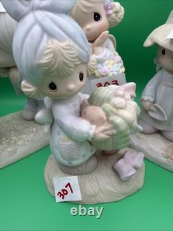 Lot 12 of precious moments figurines