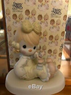 Lot of 32 collectible Precious Moments porcelain figurines