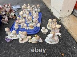 Lot of 35 Vintage Precious moment figurines