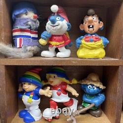 Lot of 40 Vintage Holiday, Smurfs, Garfield, Precious Moments and more Figurines