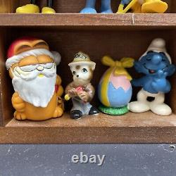 Lot of 40 Vintage Holiday, Smurfs, Garfield, Precious Moments and more Figurines