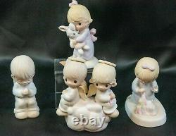 Lot of 44 Precious Moments Figurines, Dolls, Bibles, & Mugs (MCE4)