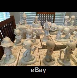 Over 90+ precious moments figurines including god loveth a cheerful giver