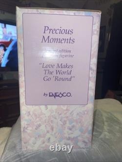 Precious Moments 139475 Love Makes The World Go Round Limited Edition