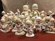 Precious Moments 2 Dolls, 37 Figurines, And 3 Plates Lot Of 42 Pieces