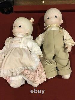 Precious Moments 2 Dolls, 37 Figurines, and 3 Plates Lot of 42 Pieces