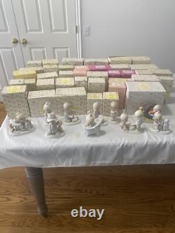 Precious Moments 50 Figurines Lot
