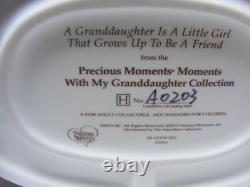 Precious Moments A GRANDDAUGHTER IS A LITTLE GIRL THAT GROWS UP TO BE A FRIEND