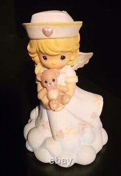 Precious Moments Angels of Mercy Nurse Figurine Collection