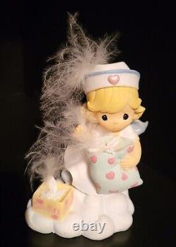 Precious Moments Angels of Mercy Nurse Figurine Collection