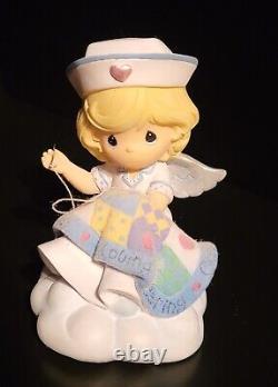 Precious Moments Angels of Mercy Nurse Figurine Collection