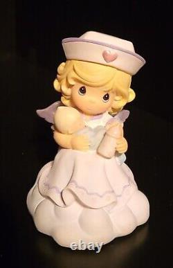 Precious Moments Angels of Mercy Nurse Figurine Collection