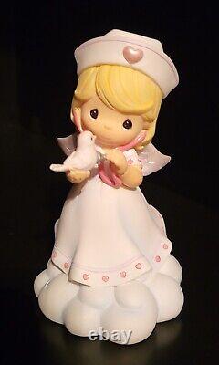 Precious Moments Angels of Mercy Nurse Figurine Collection