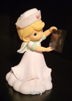 Precious Moments Angels of Mercy Nurse Figurine Collection