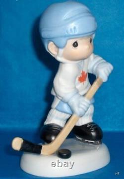 Precious Moments Canadian Exclusive Hockey Player # 99 Let's Keep Our Eye On