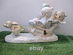 Precious Moments Figurine #109819 Oh What Fun It Is To Ride Mint in box