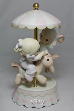 Precious Moments Figurine 139475, Love MAkes The World Go'Round withbox