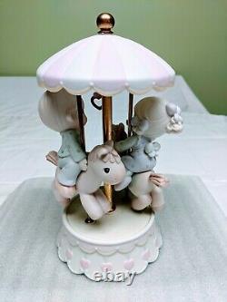 Precious Moments Figurine #139475 Love Makes The World Go'Round