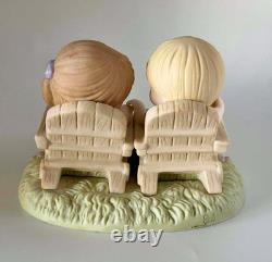 Precious Moments Figurine Kids on Benches with Puppies