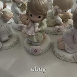 Precious Moments Growing In Grace Brunette, Ages 1-12 Figurines Good Condition