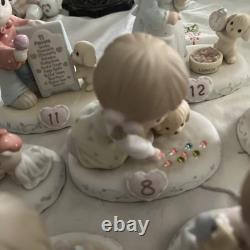 Precious Moments Growing In Grace Brunette, Ages 1-12 Figurines Good Condition