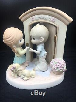 Precious Moments Hands Build Houses, Hearts Build Homes Figurine