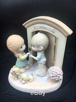 Precious Moments Hands Build Houses, Hearts Build Homes Figurine