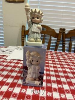 Precious Moments Porcelain Figurine