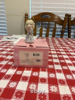 Precious Moments Porcelain Figurine