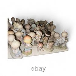 Precious Moments Porcelain Figurine