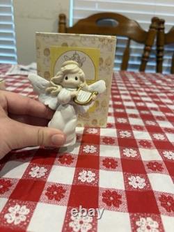 Precious Moments Porcelain Figurine