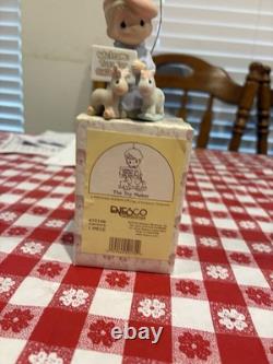 Precious Moments Porcelain Figurine
